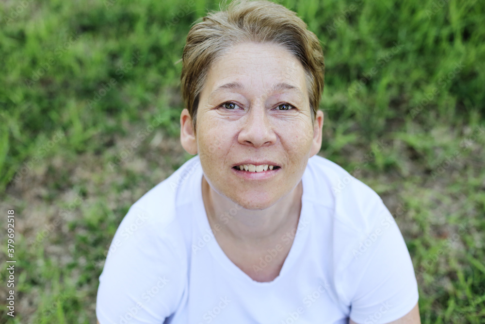 outdoor portrait of beautiful 45 years old woman outdoor portrait of beautiful 45 years old woman