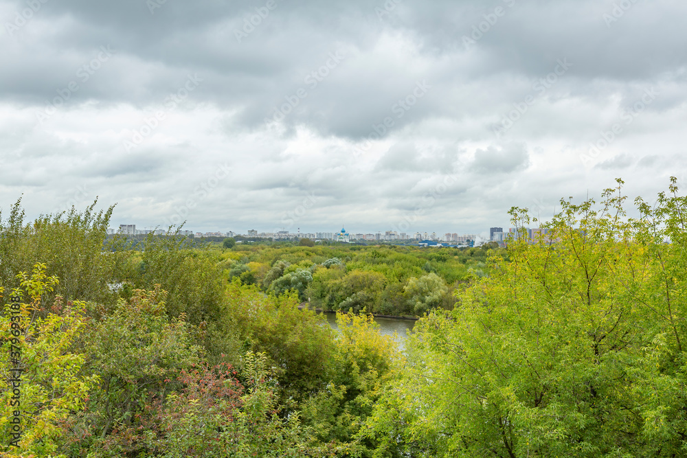 City view from Kolomenskoye park on a cloudy day. Moscow, Russia
