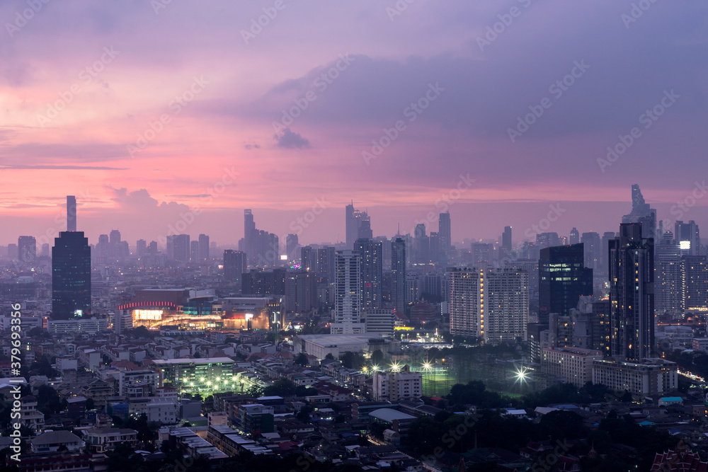 Fototapeta premium Bangkok downtown cityscape with skyscrapers at evening give the city a modern style. No focus, specifically.