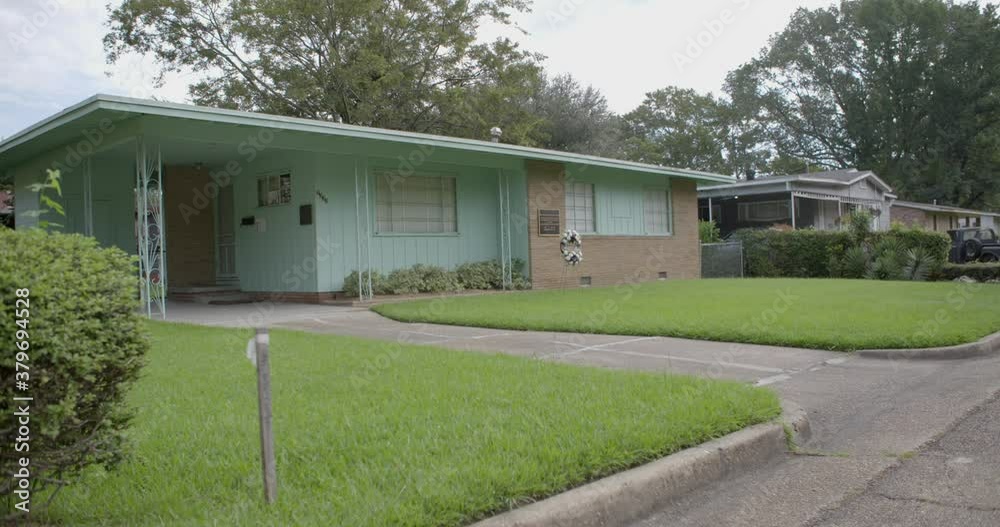 Rack focus from street: Civil rights leader Medgar Evers home. Site of his assassination. Jackson, Mississippi. Rack focus from street: Civil rights leader Medgar Evers home. Site of his assassination. Jackson, Mississippi.