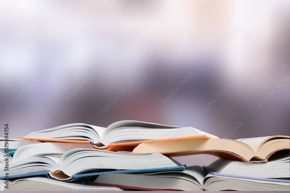 Open books collection on a blur background. Open books collection on a blur background.