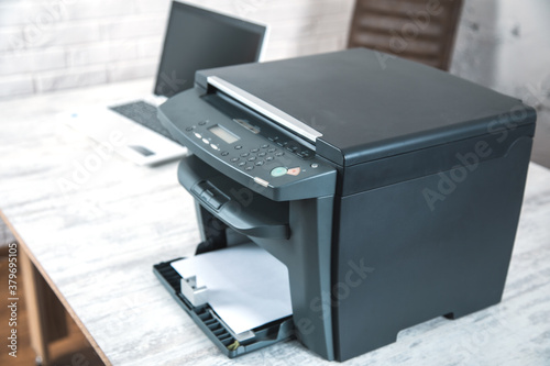 Printer and computer in the office table