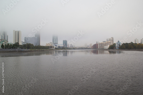 city embankment in the fog © Денис Жердев