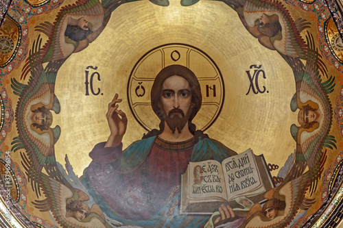 Fresco of Jesus Christ. Church of the assumption of the blessed virgin Mary photo