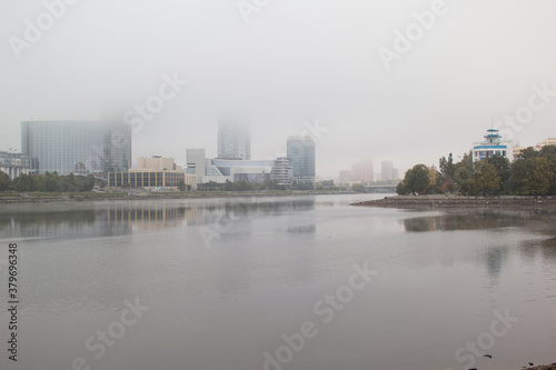 city embankment in the fog