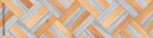 Light parquet floor with square pattern. Wooden boards texture background. Rough wooden surface. 