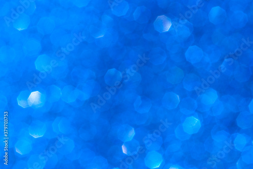 abstract blue bokeh background from glitter