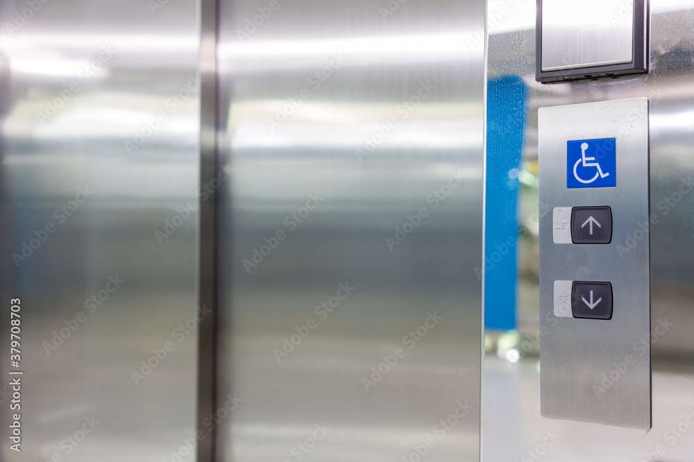 Image of disabled lift button. Stainless steel elevator panel push buttons for blind and disability people. Push Button For the disabled. Care and technology. Elevator buttons for disabled people. Image of disabled lift button. Stainless steel elevator panel push buttons for blind and disability people. Push Button For the disabled. Care and technology. Elevator buttons for disabled people.