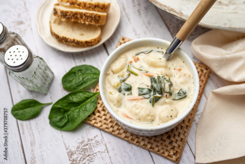 Homemade Italian cream soup with potato gnocchi, Traditional Italian chicken gnocchi 