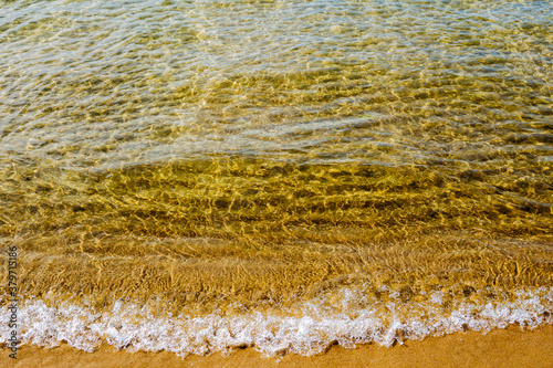 Beautiful pop sea waves and beach
