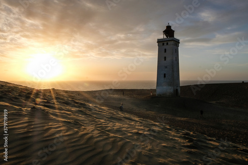 Famous Lighthouse Rubjerg knude fyr at Sunrise  Denmark  Europe