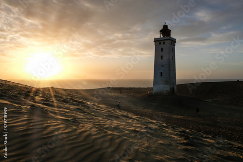 Famous Lighthouse Rubjerg knude fyr at Sunrise, Denmark, Europe