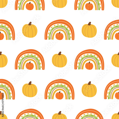 Fall rainbow with pumpkin pattern Cute autumn seamless background for fall season. Baby rainbow. Thanksgiving time