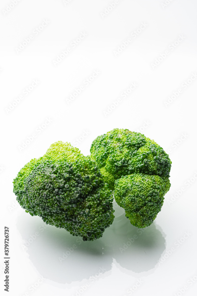 Fresh green broccoli on a white background. High quality photo Fresh green broccoli on a white background. High quality photo