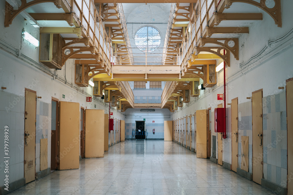 The old prison. The cell block on the inside of an old prison. Prison interior The old prison. The cell block on the inside of an old prison. Prison interior