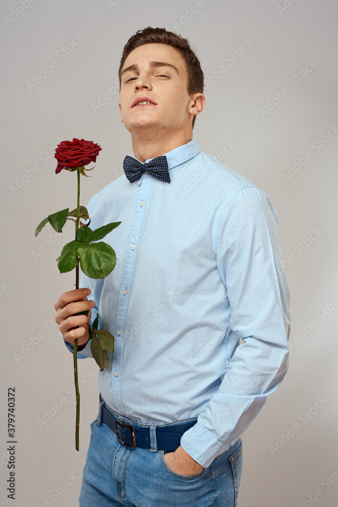 romantic man with red rose and light shirt pants suit romantic man with red rose and light shirt pants suit