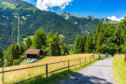 Lonely house near mountain village Lauterbrunnen, Bernese Oberland, Switzerland. photo