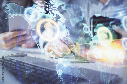 Wallpaper Mural Double exposure of man and woman working together and financial graph hologram. Business concept. Computer background. Torontodigital.ca