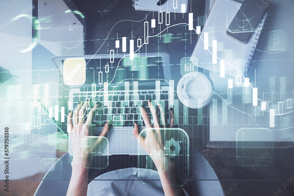 Double exposure of woman hands working on computer and forex chart hologram drawing. Top View. Financial analysis concept. Double exposure of woman hands working on computer and forex chart hologram drawing. Top View. Financial analysis concept.