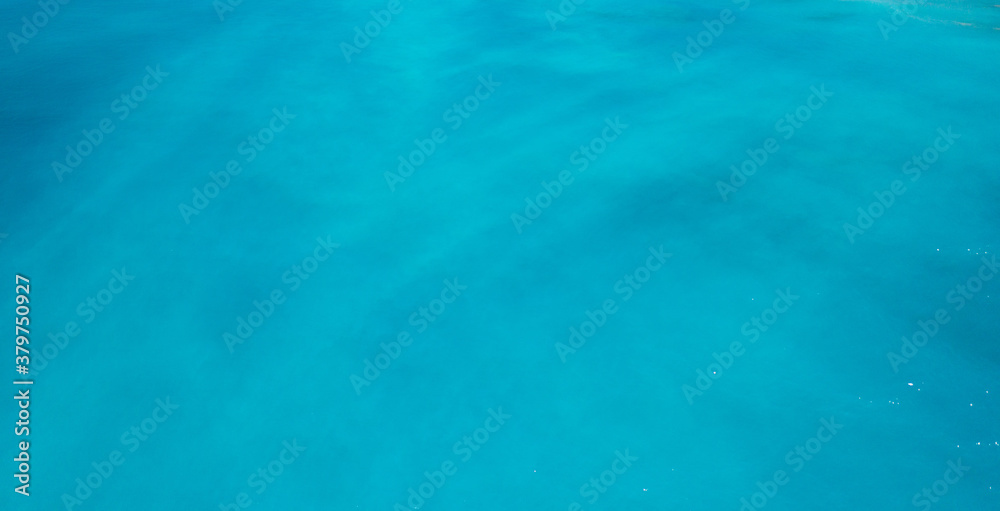 aerial shot of strange colors of water in the ocean aerial shot of strange colors of water in the ocean