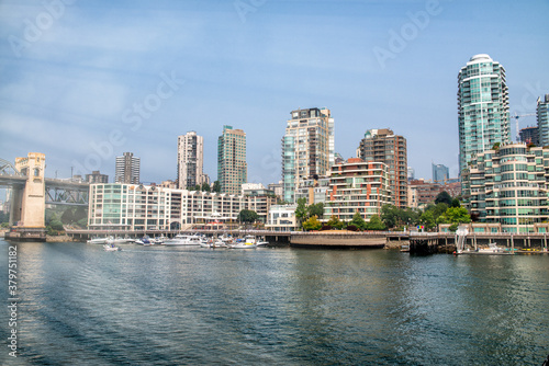 VANCOUVER - AUGUST 9, 2017: Vancouver City skyline from Granville Island © jovannig