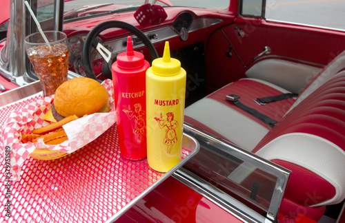 50's drive in hamburger tray on vintage automobile window