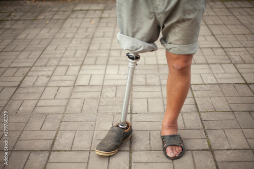 Metal prosthetic leg. Simple prosthetics for a man s leg.