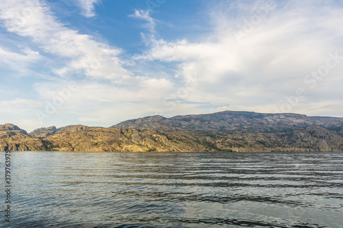 Okanagan lake view at summer time with blue sky british columbia canada