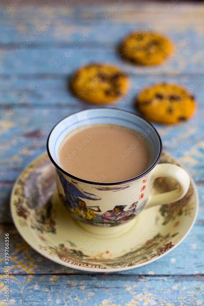 Hot milk coffee with abstract background and cookies Hot milk coffee with abstract background and cookies