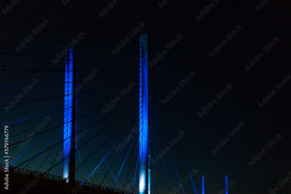 Obraz premium steel bridge over waterway evening sky