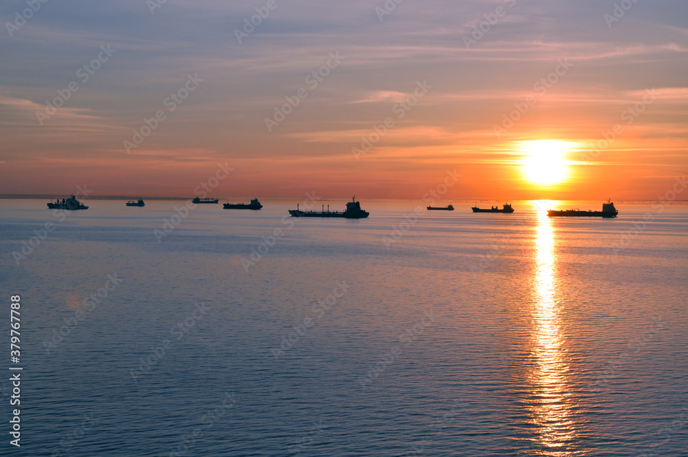 ships at sunset
