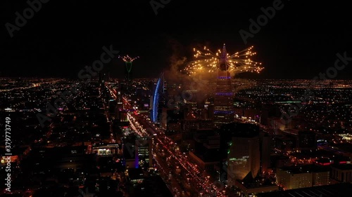 Aerial shot of fireworks from Al Faisaliyah Tower and other towers,  Riyadh, Saudi Arabia photo