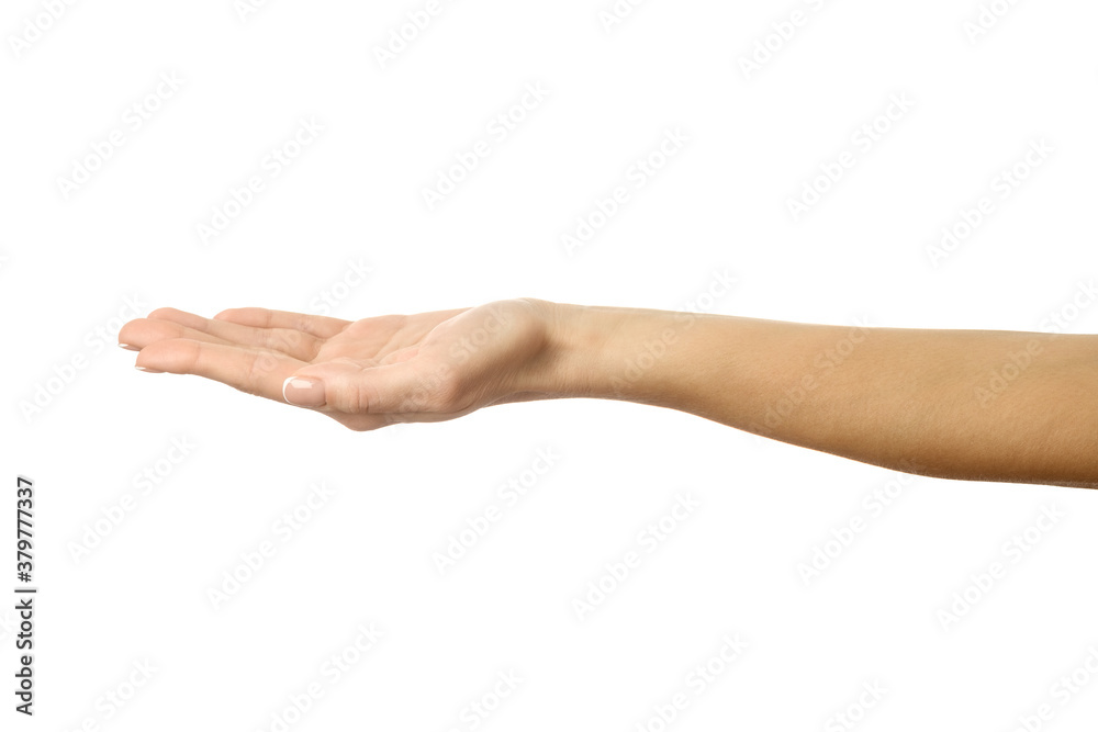 Outstretched female hand. Woman hand gesturing isolated on white Outstretched female hand. Woman hand gesturing isolated on white