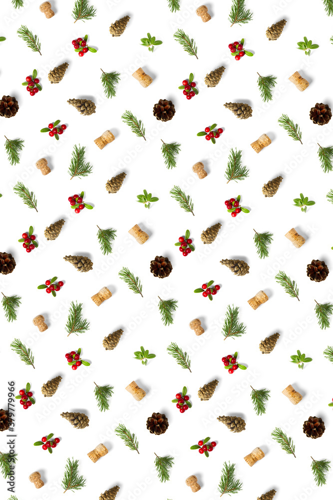 christmas background with pine cone, wine cork, pine twig and lingonberry. christmas background on white backdrop.