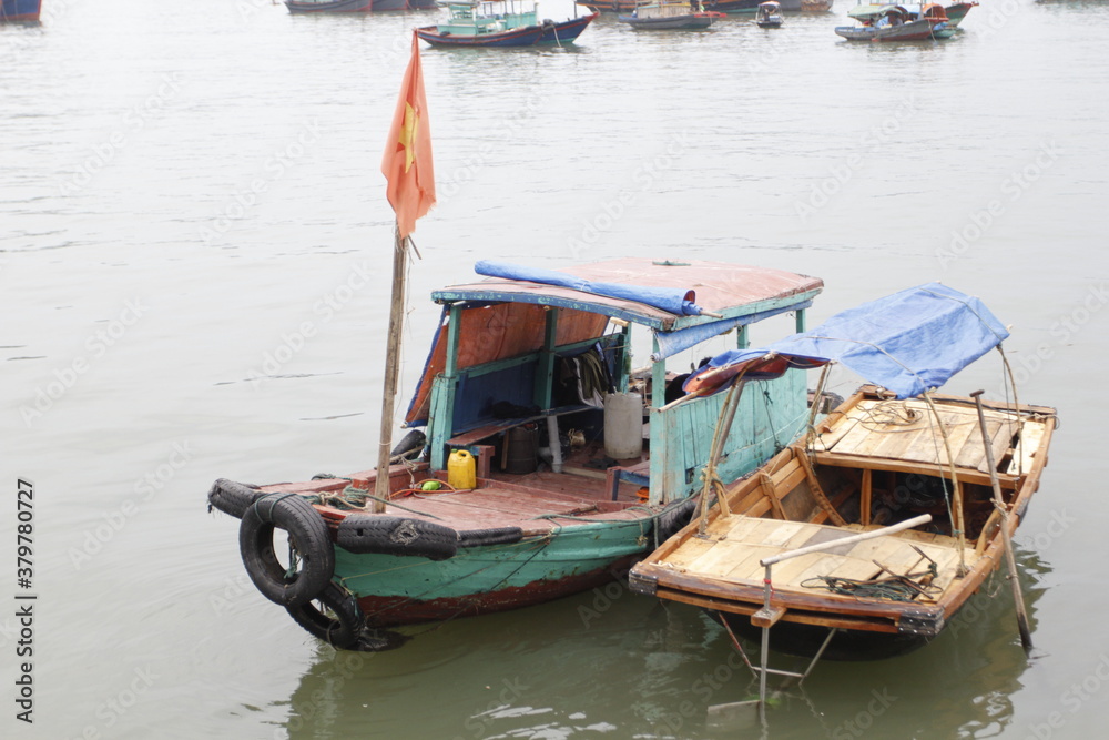 Floating Fishing Village In The Ha Long Bay. Cat Ba Island, Vietnam Asia. Cat Ba, Vietnam - March 5, 2020 Floating Fishing Village In The Ha Long Bay. Cat Ba Island, Vietnam Asia. Cat Ba, Vietnam - March 5, 2020