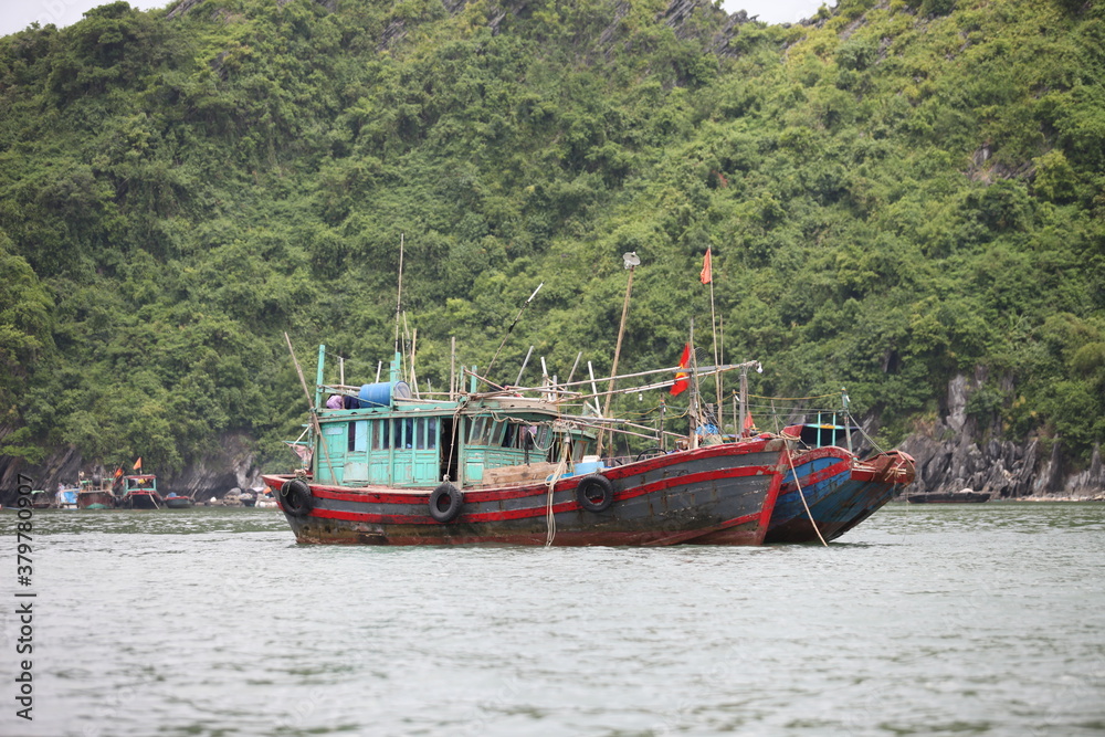 Floating Fishing Village In The Ha Long Bay. Cat Ba Island, Vietnam Asia. Cat Ba, Vietnam - March 5, 2020 Floating Fishing Village In The Ha Long Bay. Cat Ba Island, Vietnam Asia. Cat Ba, Vietnam - March 5, 2020