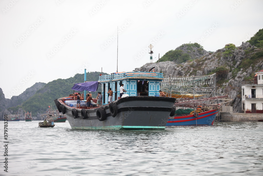 Floating Fishing Village In The Ha Long Bay. Cat Ba Island, Vietnam Asia. Cat Ba, Vietnam - March 5, 2020