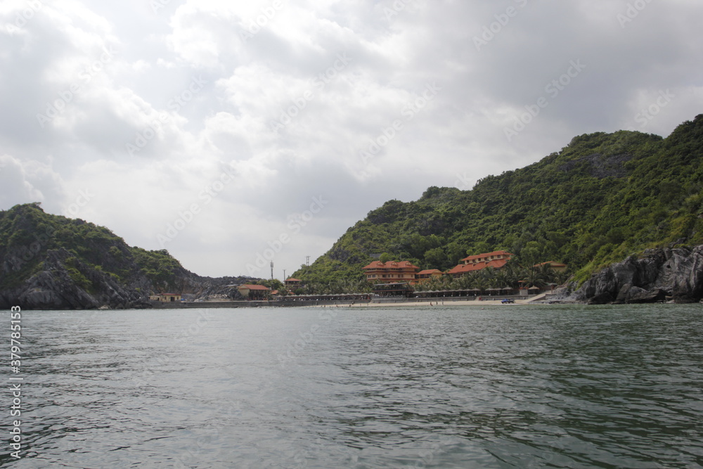 HA LONG BAY, VIETNAM - NOVEMBER 13, 2018: Halong Bay, Vietnam. Unesco World Heritage Site. Traditional tourist boats. HA LONG BAY, VIETNAM - NOVEMBER 13, 2018: Halong Bay, Vietnam. Unesco World Heritage Site. Traditional tourist boats.