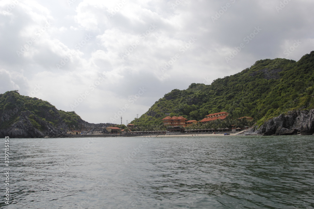 HA LONG BAY, VIETNAM - NOVEMBER 13, 2018: Halong Bay, Vietnam. Unesco World Heritage Site. Traditional tourist boats.