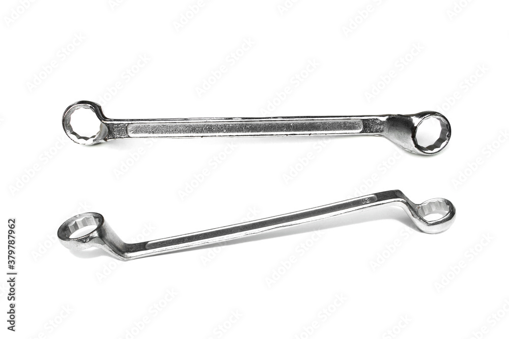 Ring spanner on white background.