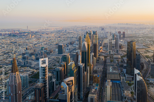 Sunrise aerial view of futuristic modern skyscrapers on Sheikh Zayed Road © Captured Blinks
