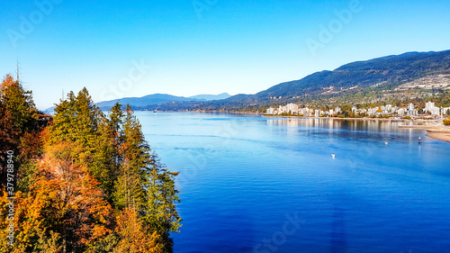 Burrard Inlet and West Vancouver at mid right with mountains on horizon - viewed from pedestrian path across Lionsgate Bridge