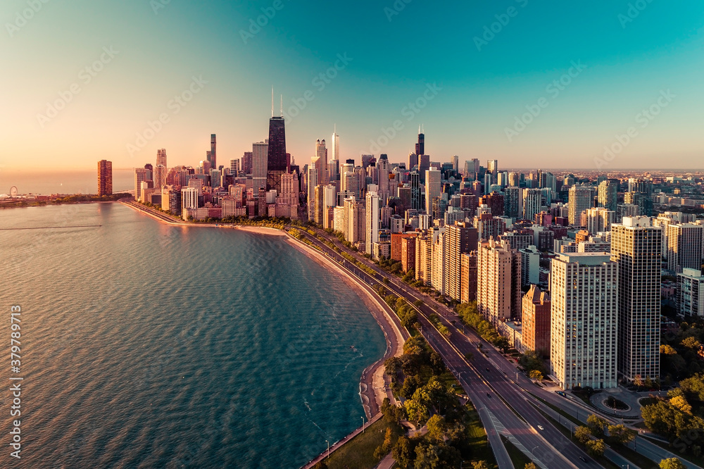 Chicago skyline aerial view with light effect applied. Sunrise above downtown buildings and Lake Michigan - obrazy, fototapety, plakaty 