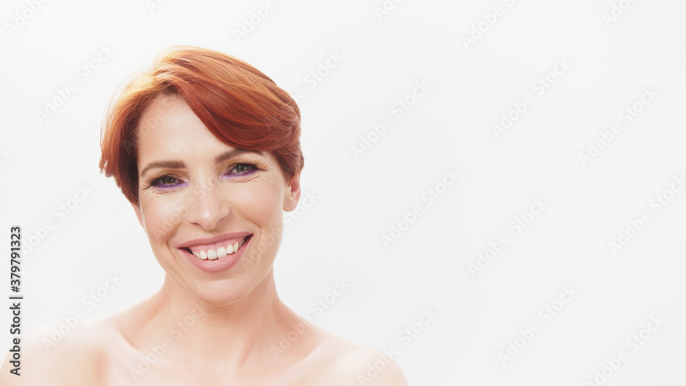 Beauty shot of redhead middle aged woman. Aging process,skin care and cosmetics. High quality photo Beauty shot of redhead middle aged woman. Aging process,skin care and cosmetics. High quality photo