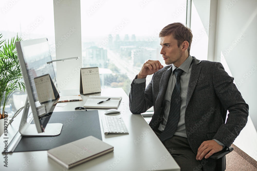 Young Businessman at His Office Young Businessman at His Office