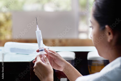 Nurse preparing medicine dose for hospitalized Patient photo