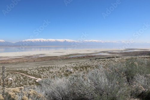 Fototapeta Naklejka Na Ścianę i Meble -  Antelope Island, Great Salt Lake and snowcapped Wasatch mountains, Utah