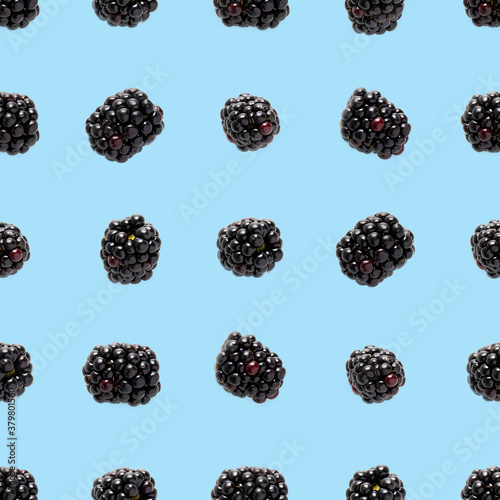Bramble Seamless pattern. Fresh blackberry seamless pattern. Pattern with fresh wild berries isolated on blue background.