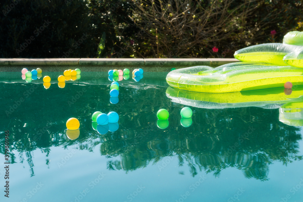 lilo and pool balls floating on the pool Stock Photo Adobe Stock