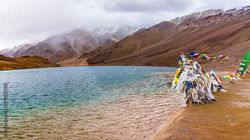 Chandratal or  Lake of the moon is a high altitude lake located at 4300m in Himalayas of Spiti Valley, Himachal Pradesh, India. The name of Lake originated due to its crescent moon like shape. photo